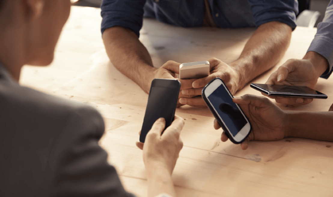 continuous-testing-in-the-cloud-people Continuous Testing in the Cloud: People examining their smartphones for vulnerabilities