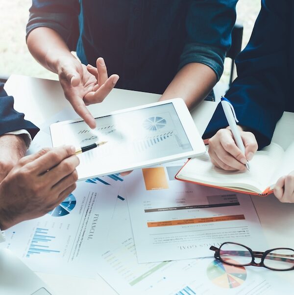 Asian,Business,Adviser,Meeting,To,Analyze,And,Discuss,The,Situation Analyst Reports